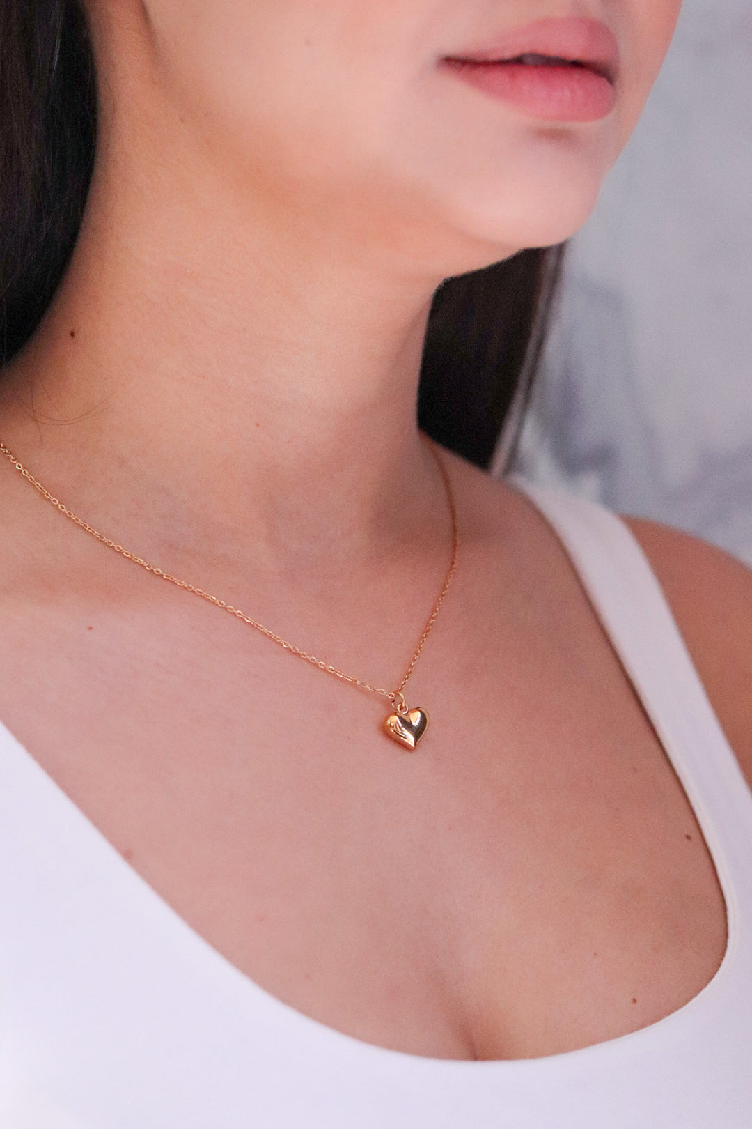 Gold Toned Necklace and Bulging Heart Pendant