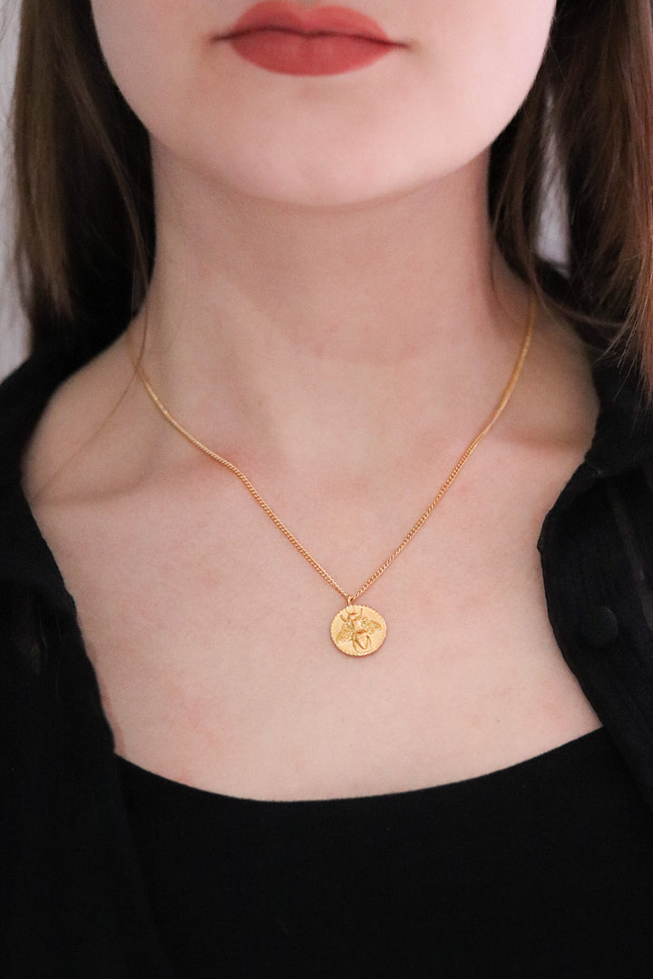 Gold Toned Necklace and Bee Disc Pendant