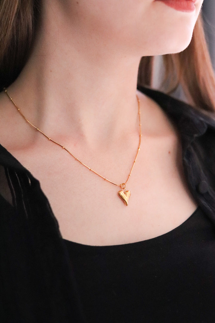 Gold Toned Snake Necklace and Pointy Heart Pendant