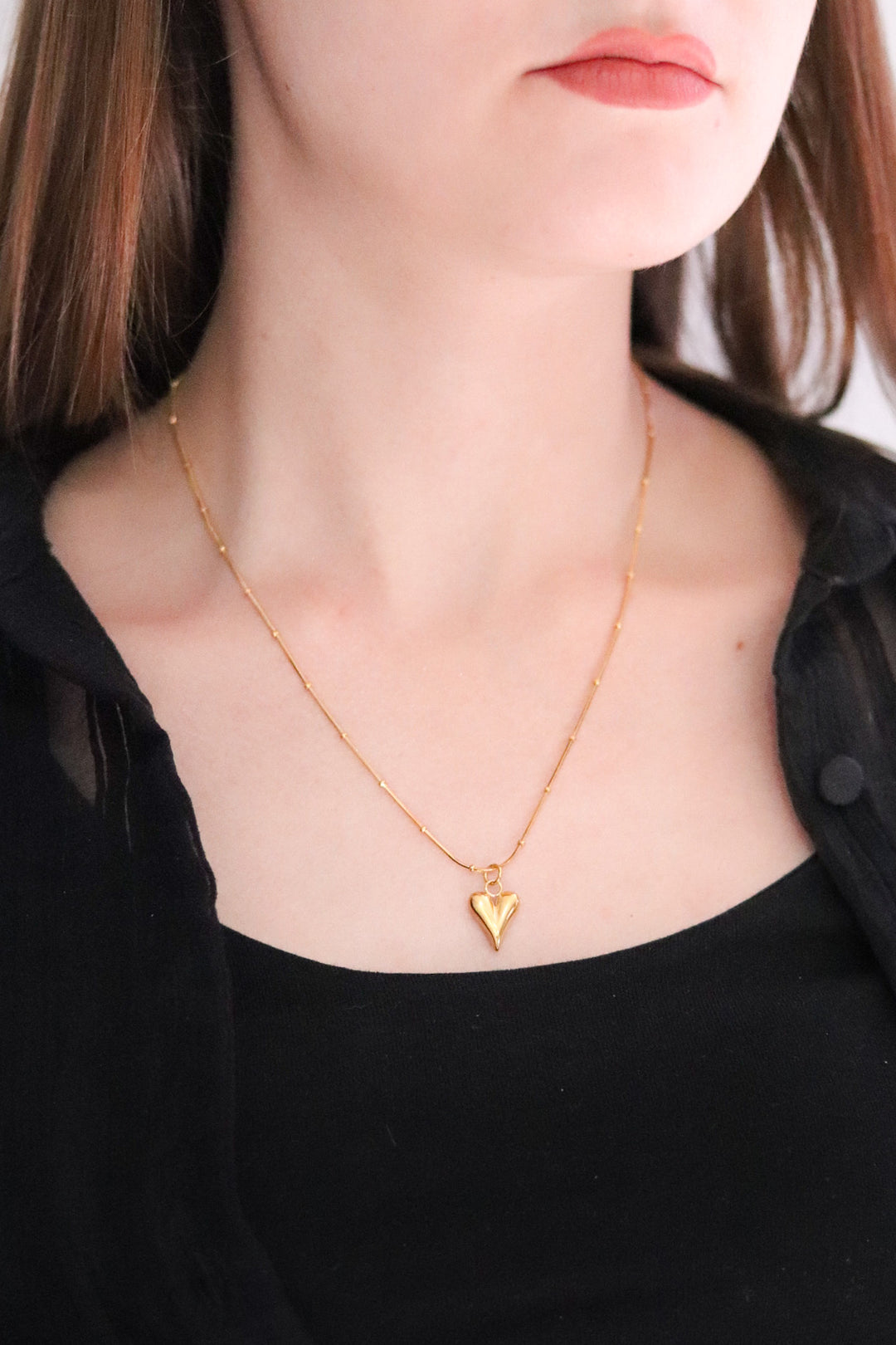 Gold Toned Snake Necklace and Pointy Heart Pendant